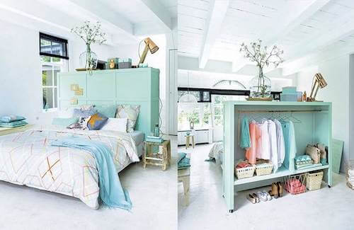 Separare gli ambienti. Armadio usato come testiera del letto.